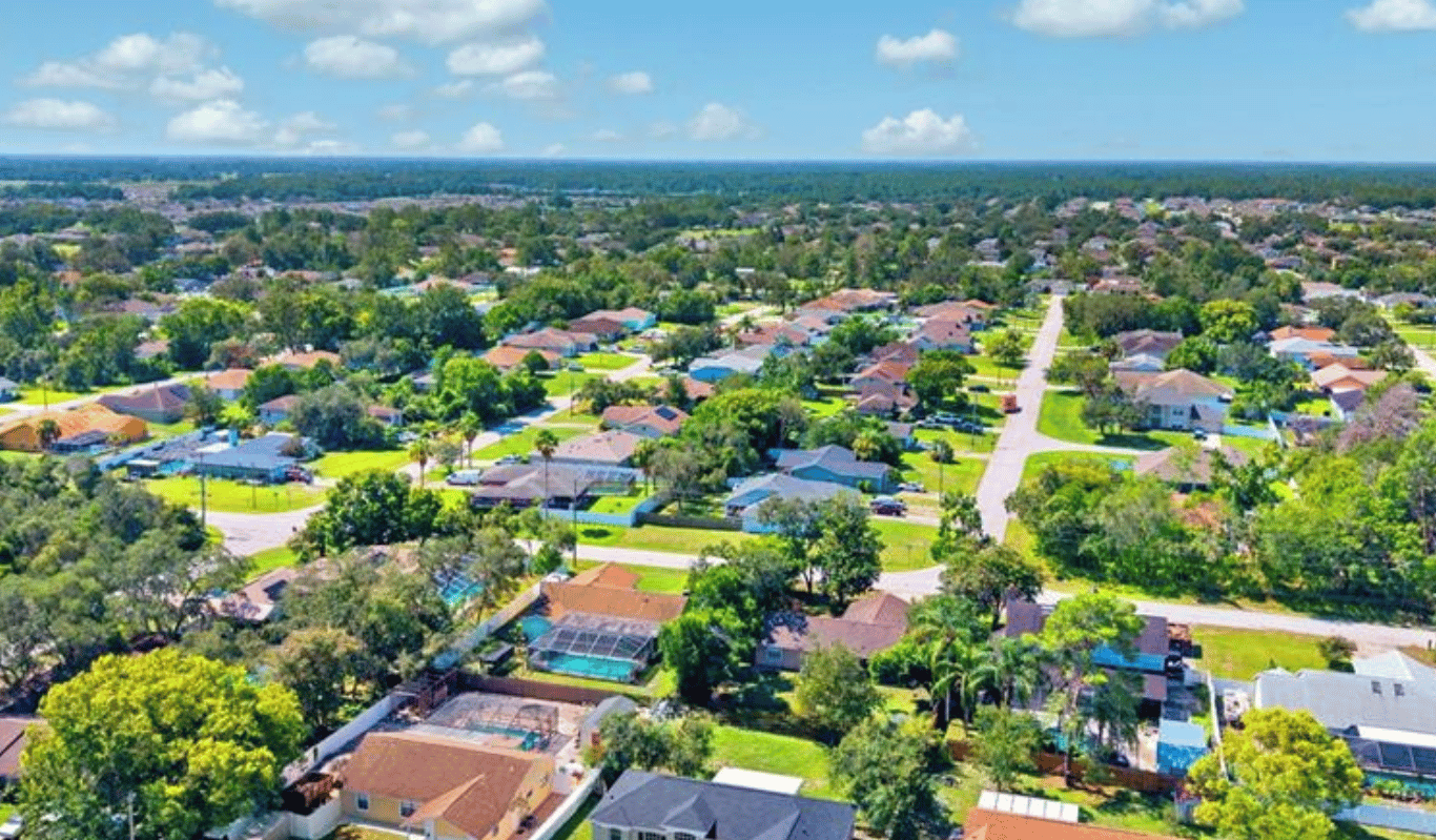 Completed shingle roof replacement on a suburban home in Spring Hill, FL, Hernando County.